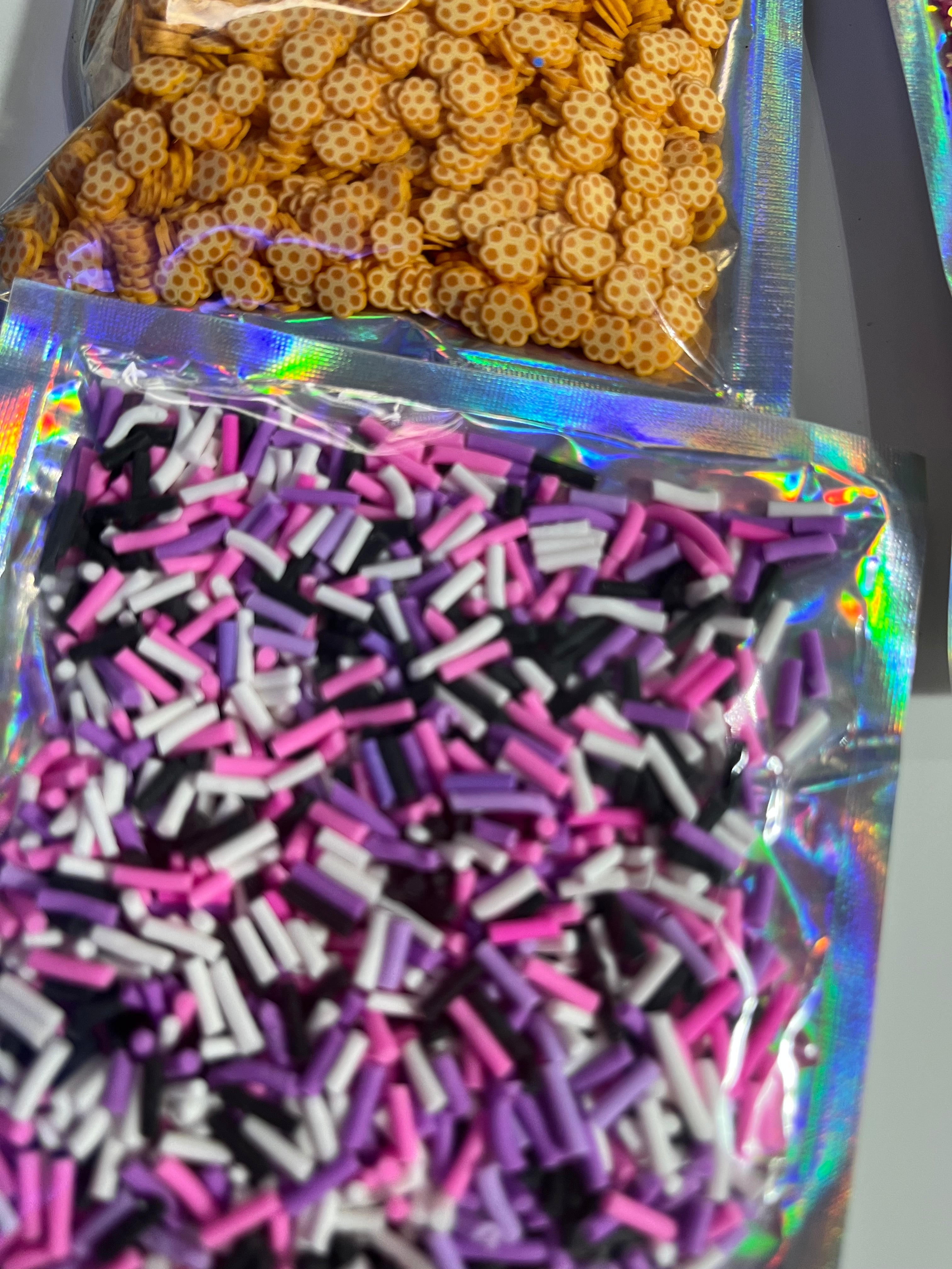 Sprinkles black pink white purple poly clay