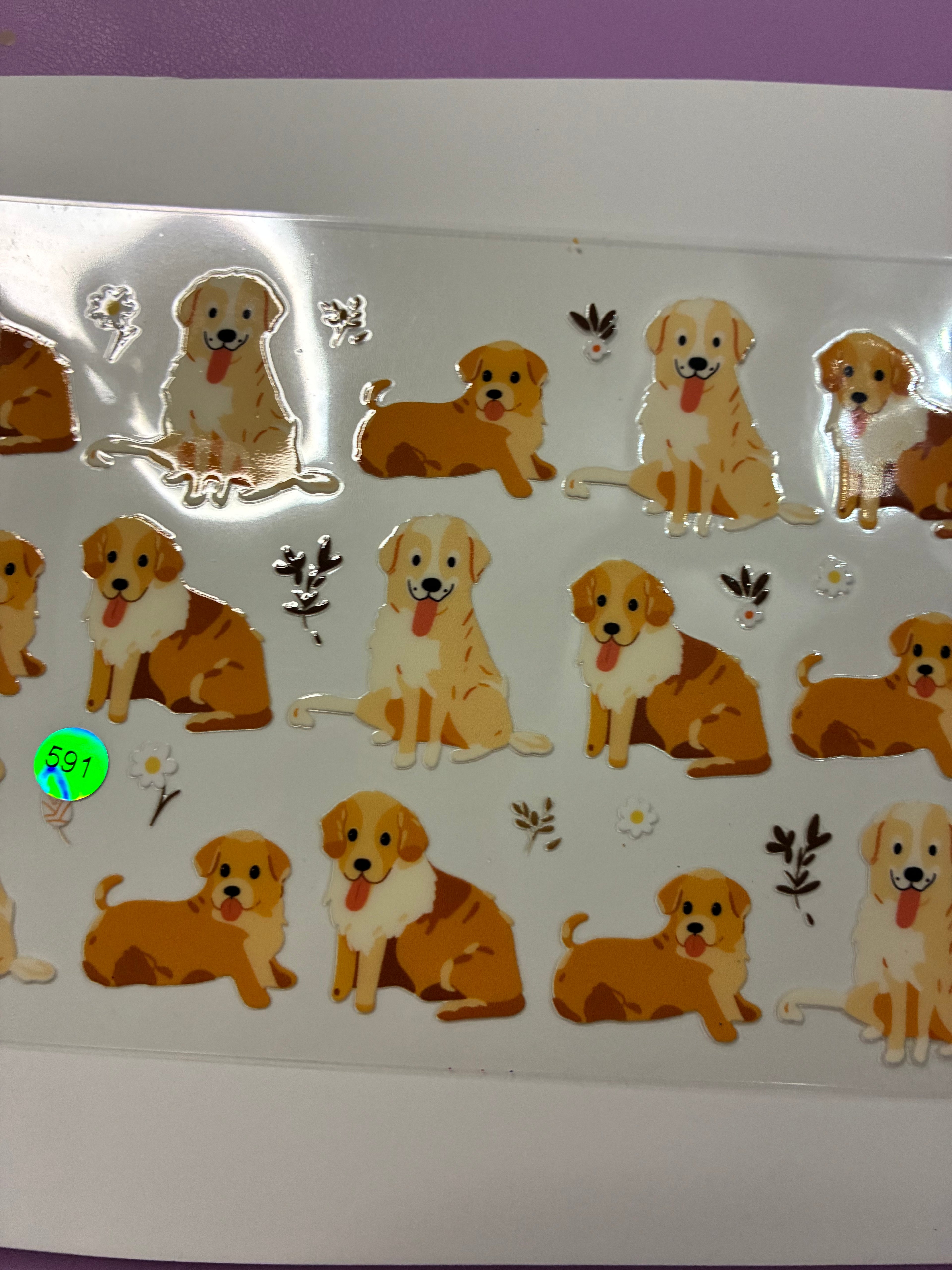 Golden retriever with daisies 591