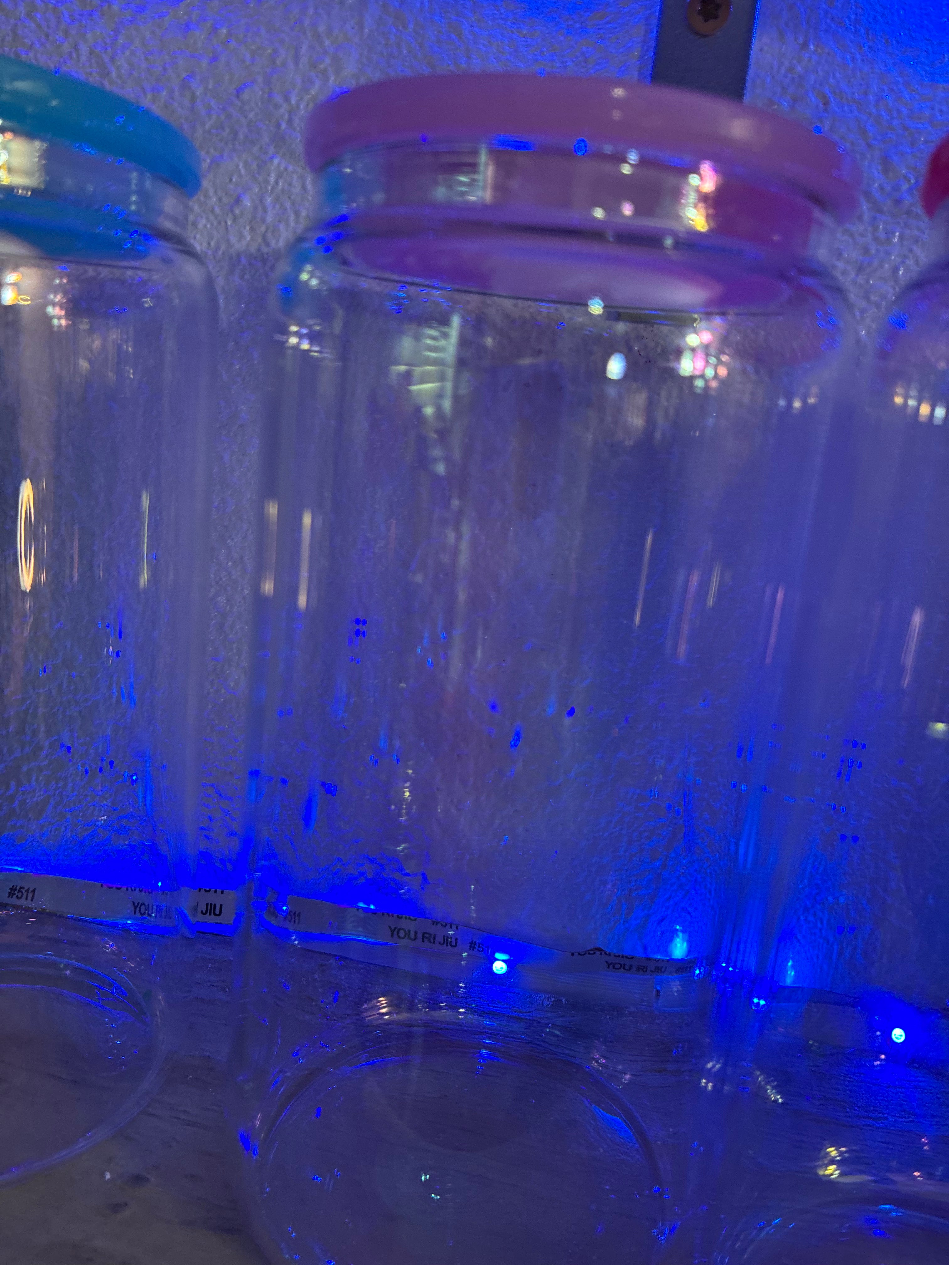 Pink lid glass iridescent cup